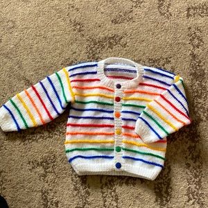 Vintage hand knit baby cardigan in rainbow colors